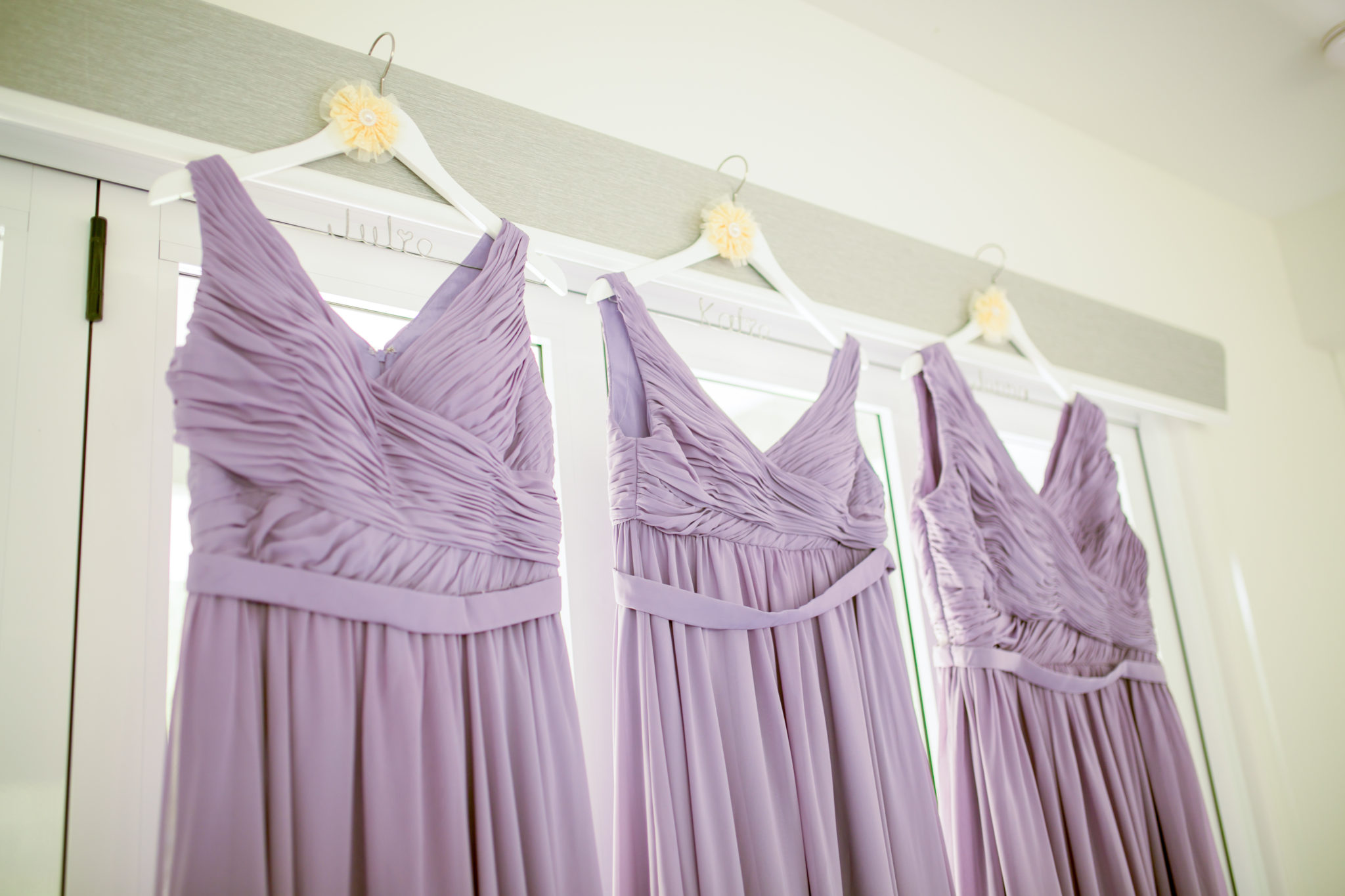 Hang your bridesmaid dresses for better detail wedding photos