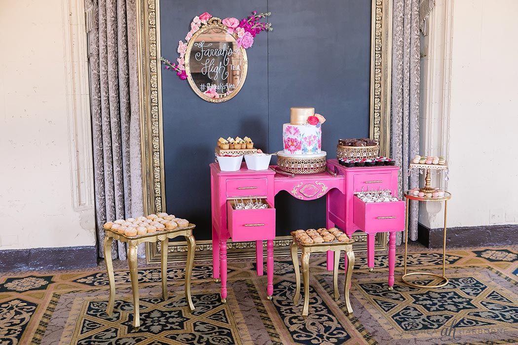 vintage dresser used for dessert bar