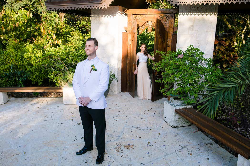 bride and groom first look | patch of heaven gardens miami