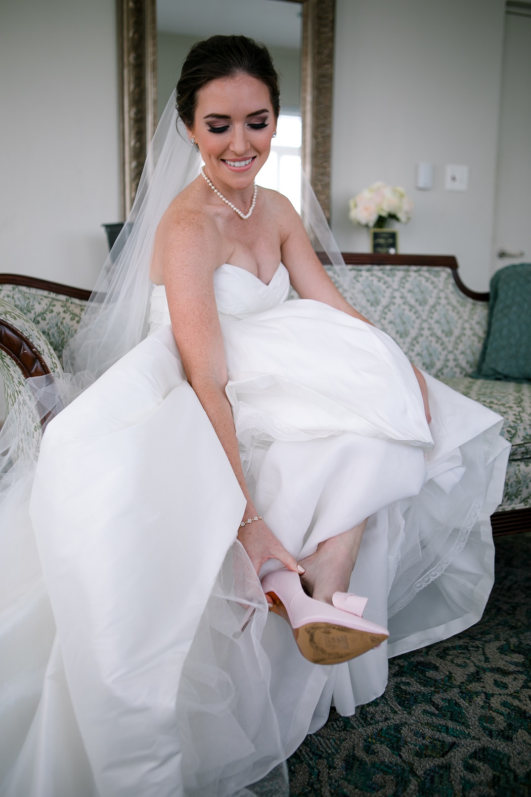 bride puts on her shoes