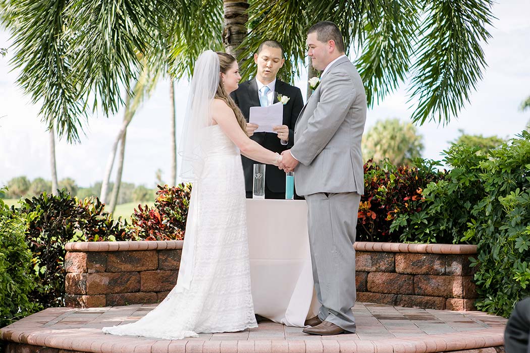 bride and groom exchange vows | Andrea Harborne Photography