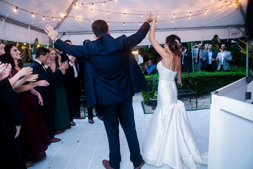 happy bride and groom after their modern wedding ceremony in biltmore hotel miami