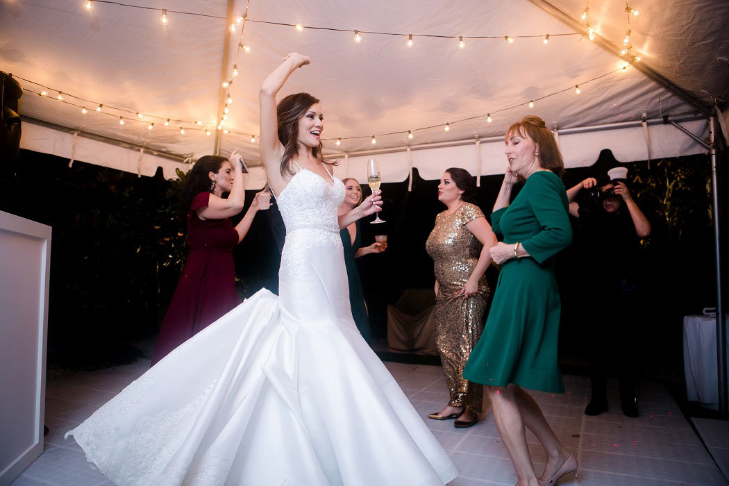 bride dancing after her wedding ceremony