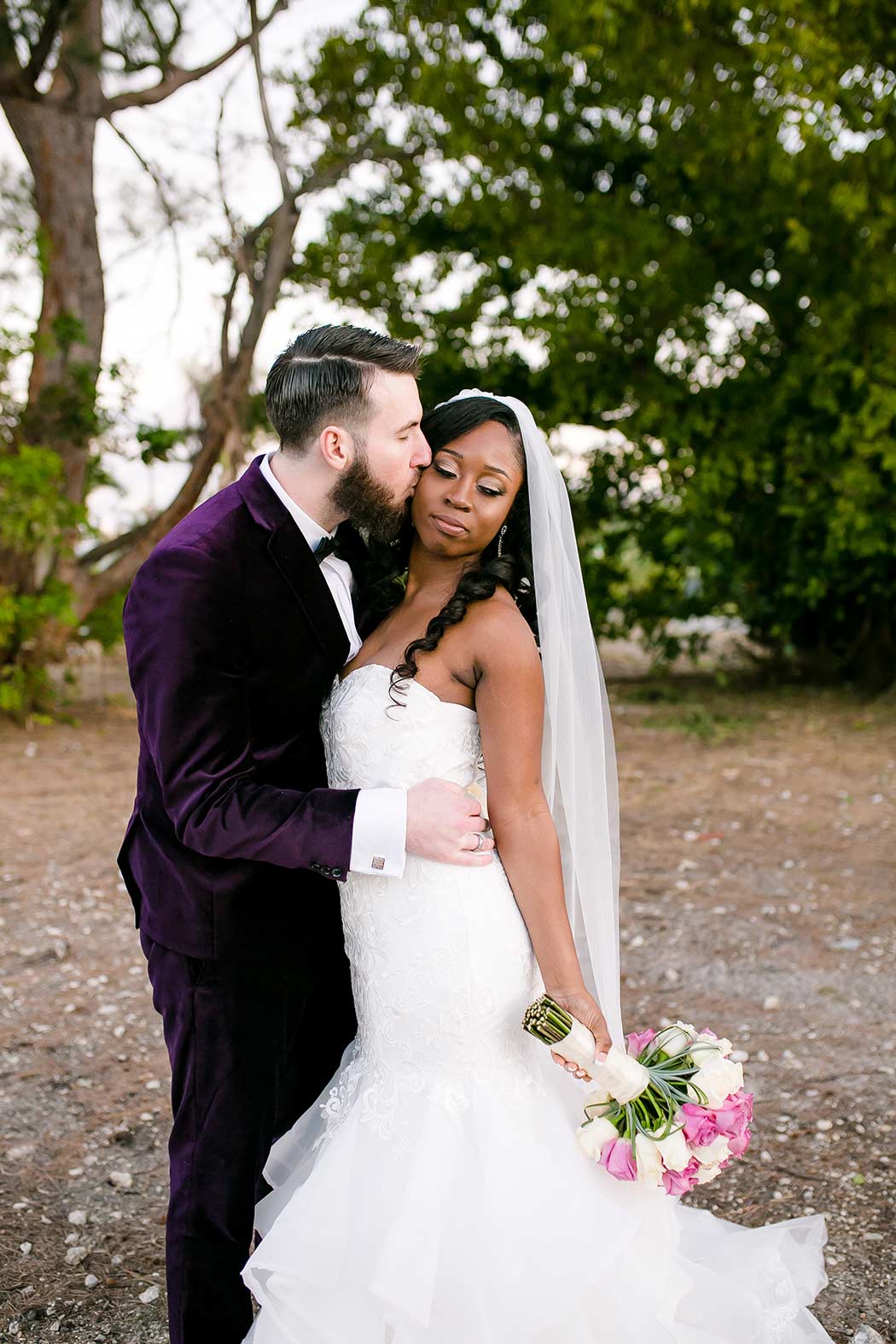 bridal portraits at the royal fiesta deerfield beach | groom wears purple crushed velvet tuxedo