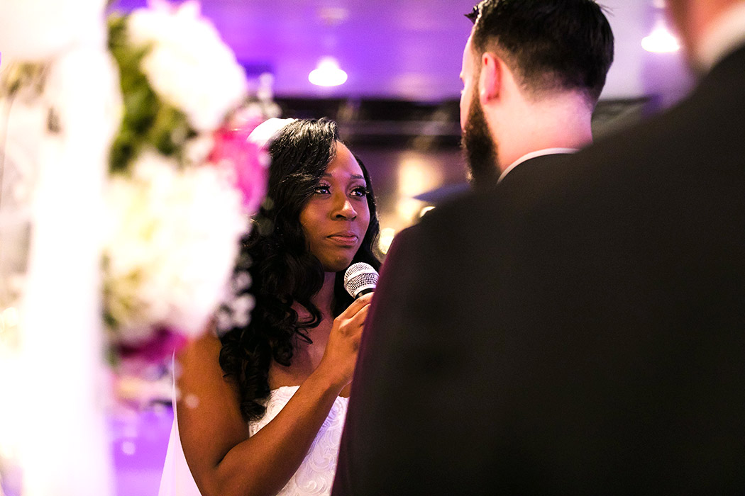 bride says her 'i do' at the wedding ceremony in royal fiesta deerfield beach