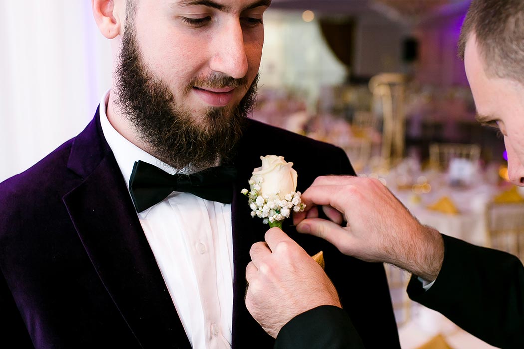 groom getting ready before his ceremony | royal fiesta deerfield beach wedding