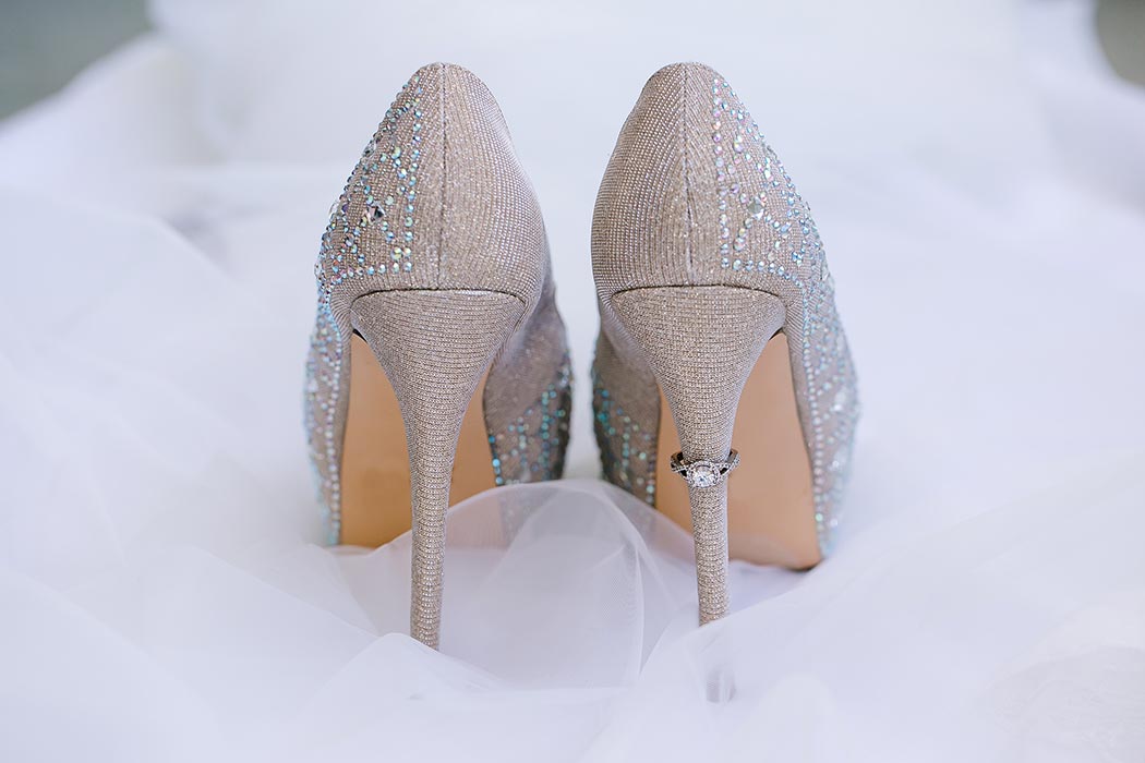 unique way of photographing diamond wedding ring and bridal shoes | gold glittery bridal shoes