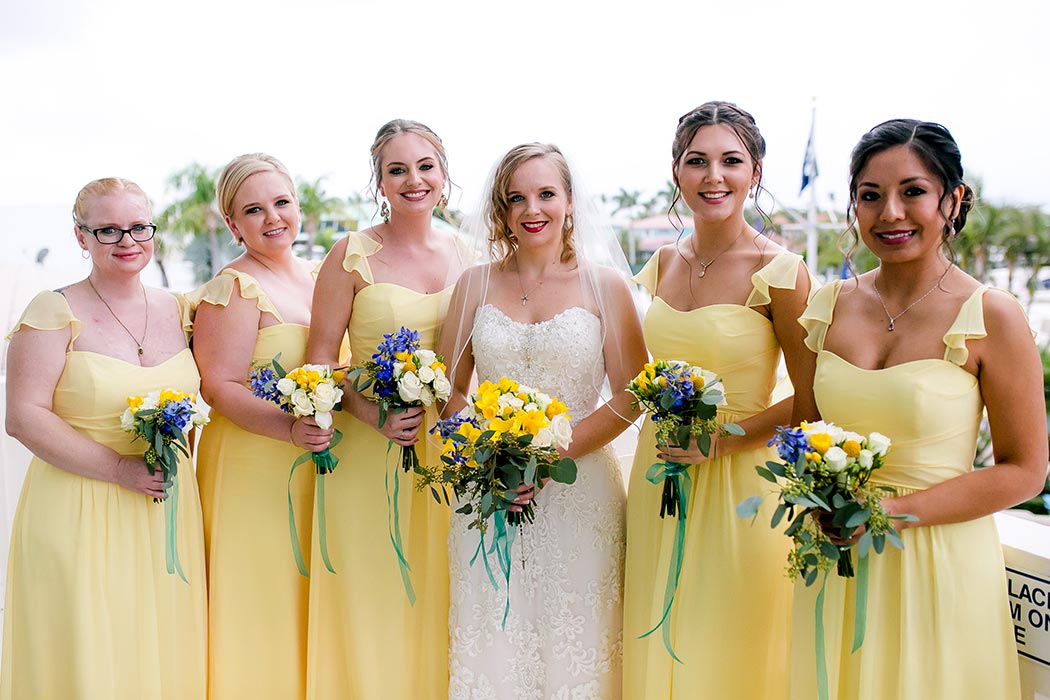 bridesmaids wearing yellow dresses | lighthouse point wedding