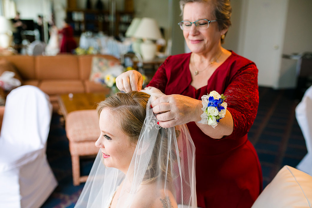 brides mum putting on her veil before lighthouse point yacht club wedding