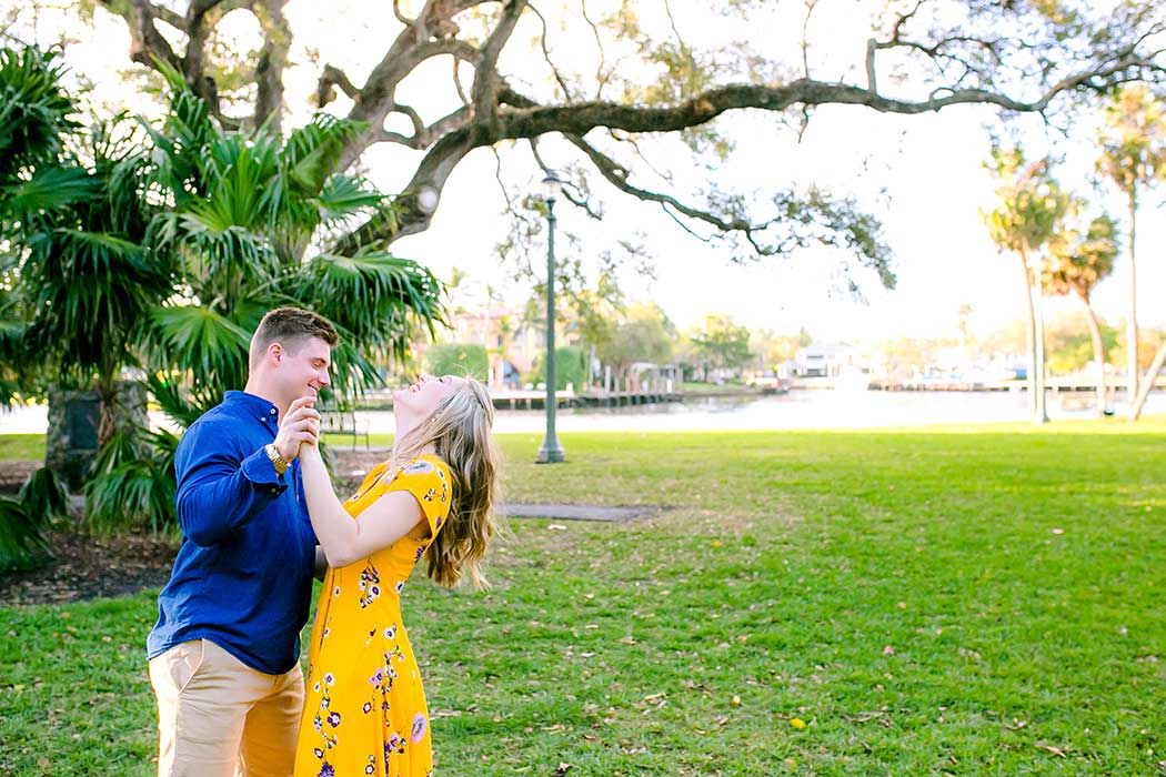 couple dancing during their las olas boulevard engagement photoshoot