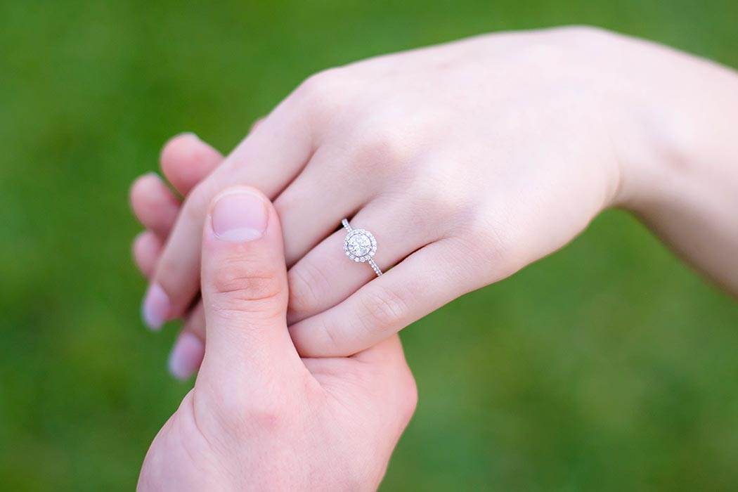 engagement photoshoot with detailed photo of diamond engagement ring