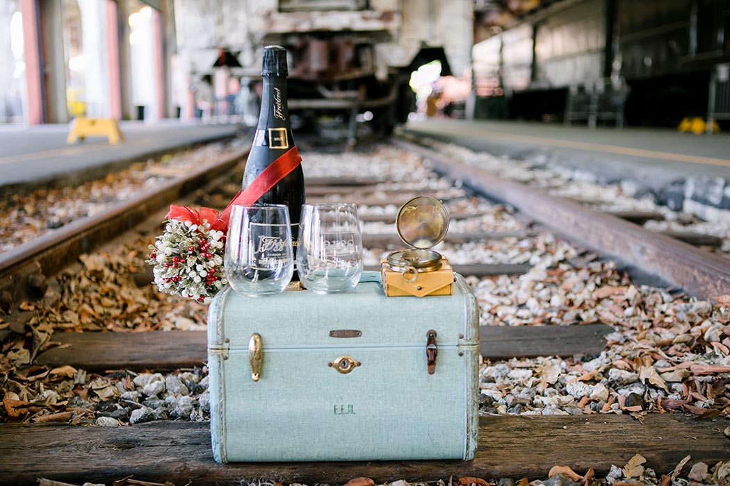 vintage luggage for photoshoot | gold coast railroad museum engagement photoshoot