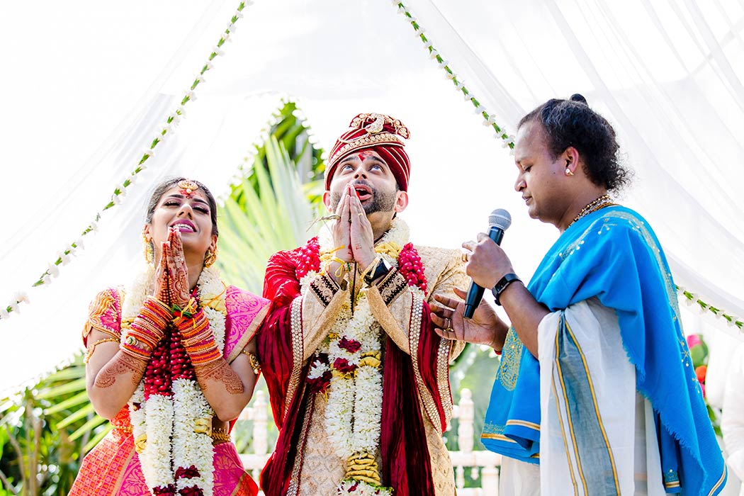 bride and groom pray during wedding | indian wedding photographer fort lauderdale south florida