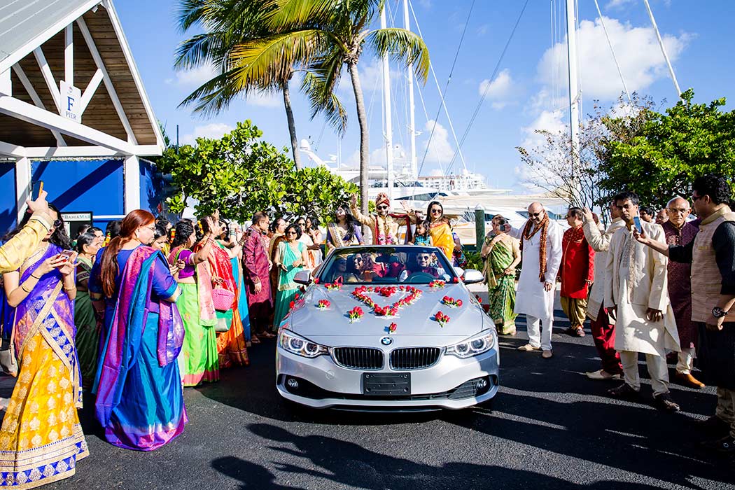 car with flowers for indian baraat | groom arrives in flowered car for wedding