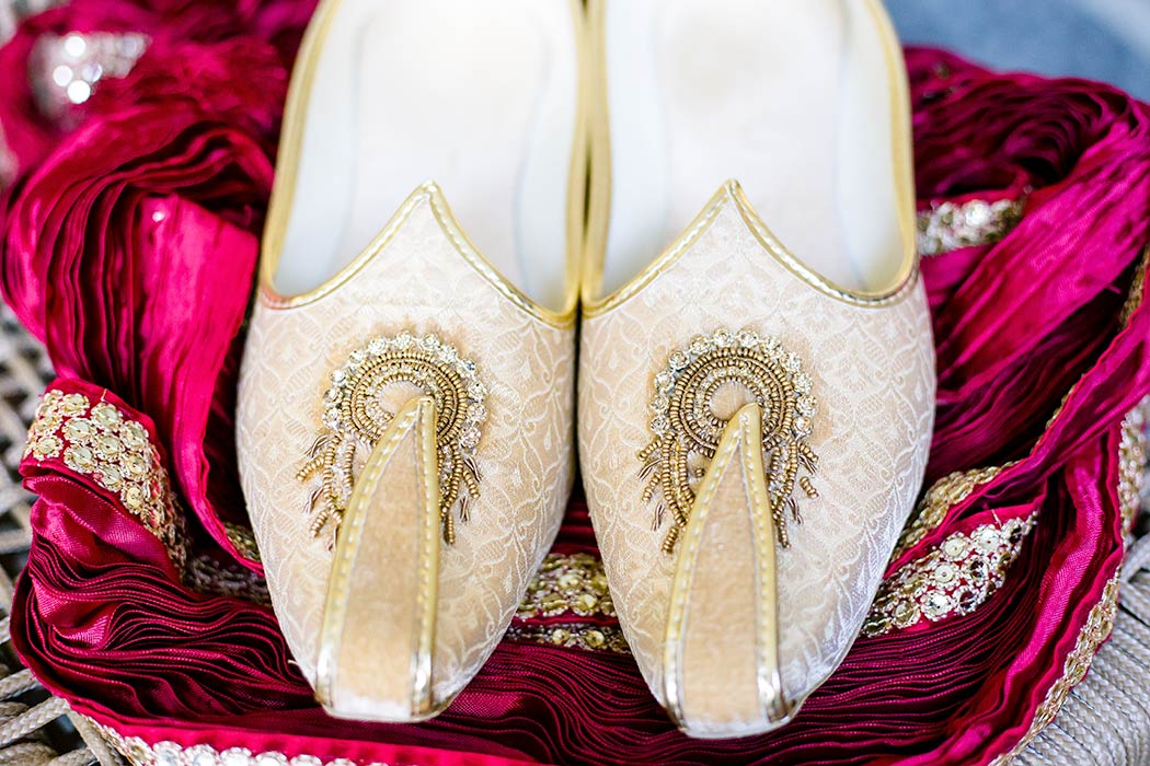 grooms wedding shoes | photograph of groom's wedding shoes | indian wedding shoes for groom in gold