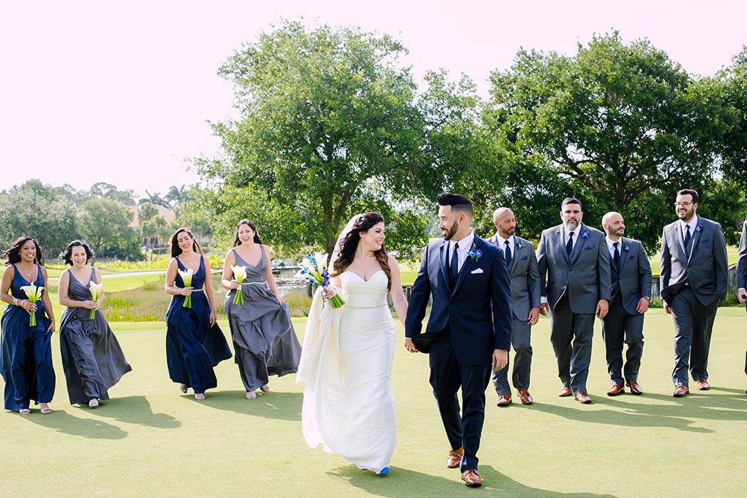 full bridal party during wedding | unique bridal party photographs | grey and navy blue bridesmaid dresses