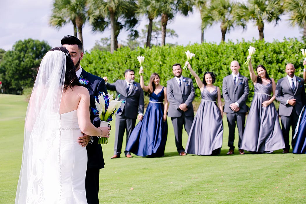 unique first look wedding idea | fun first look wedding photograph with bridal party