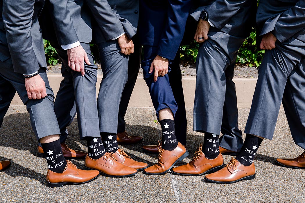 groom and groomsmen take fun photographs for wedding | unique wedding images for groomsmen | biltmore hotel miami wedding