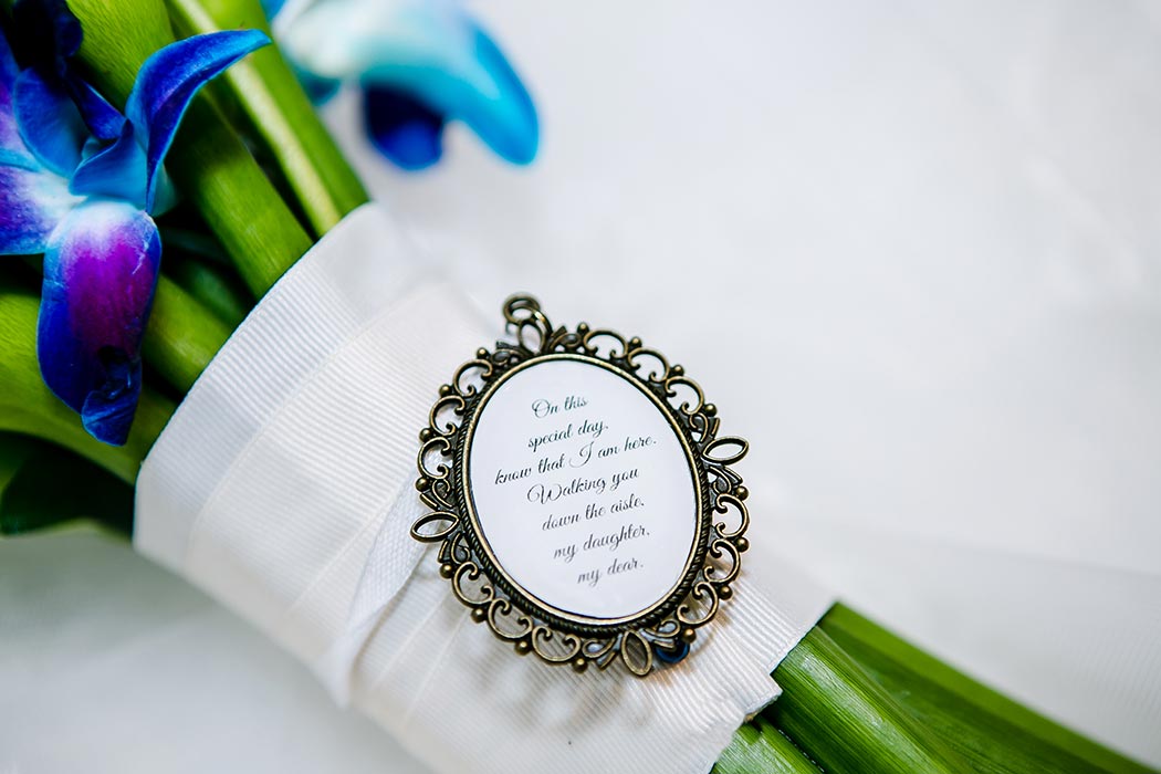 wedding detail shots on lace veil | purple orchid wedding bouquet | personalized wedding bouquet locket