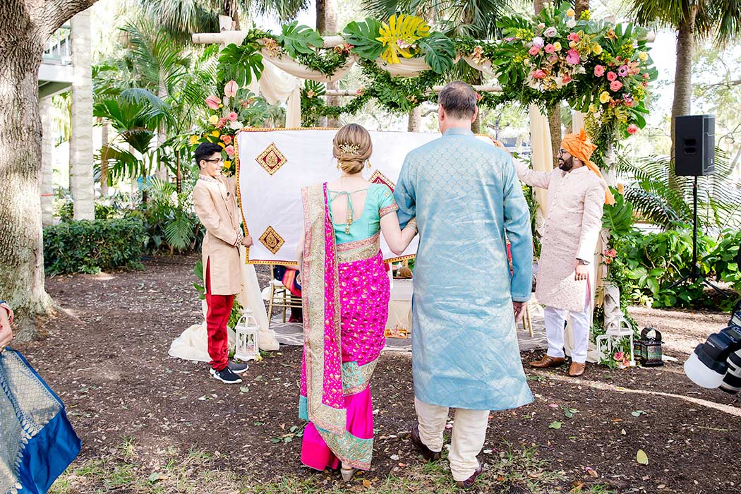 indian bride approaches mandap | south florida indian wedding photography | fort lauderdale historical society wedding