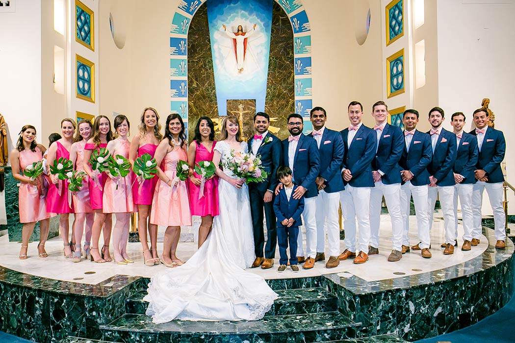 unique wedding party photography | pink bridesmaids dresses | church wedding bridal picture