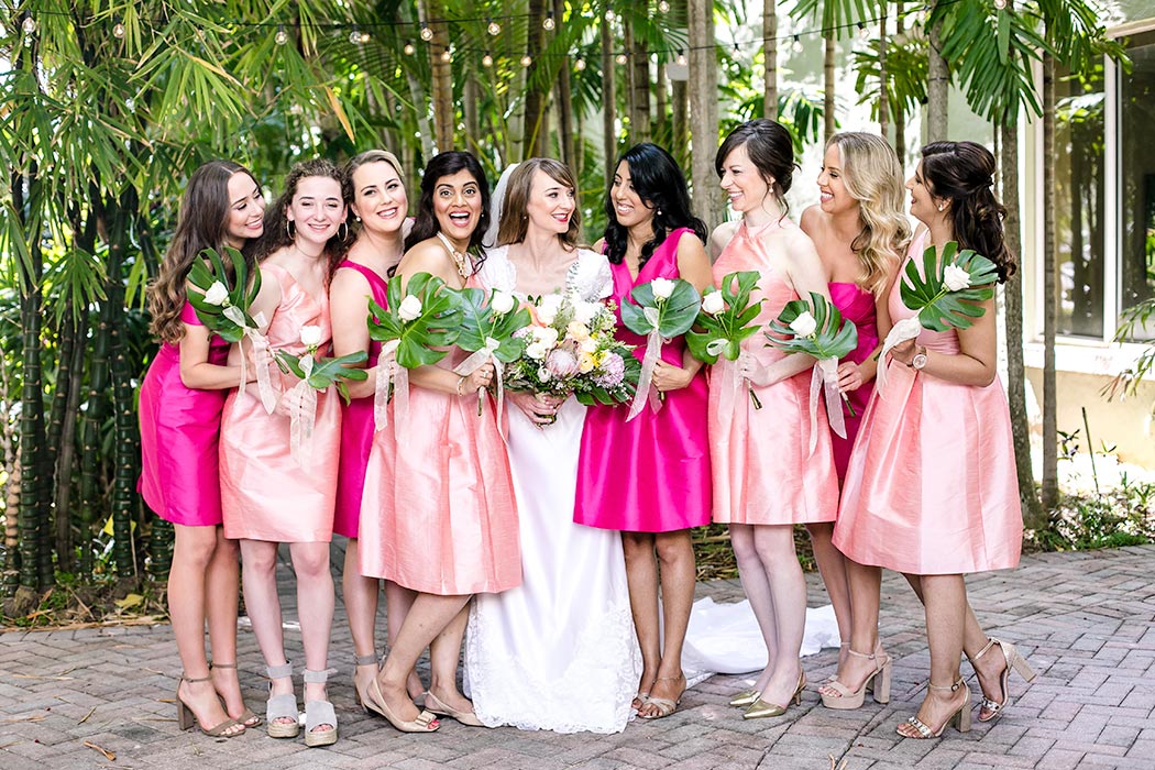 hot pink short bridesmaids dresses | pink bridesmaid dresses | tropical indian wedding in fort lauderdale | bride and bridesmaids in pink | unique bridesmaids dresses