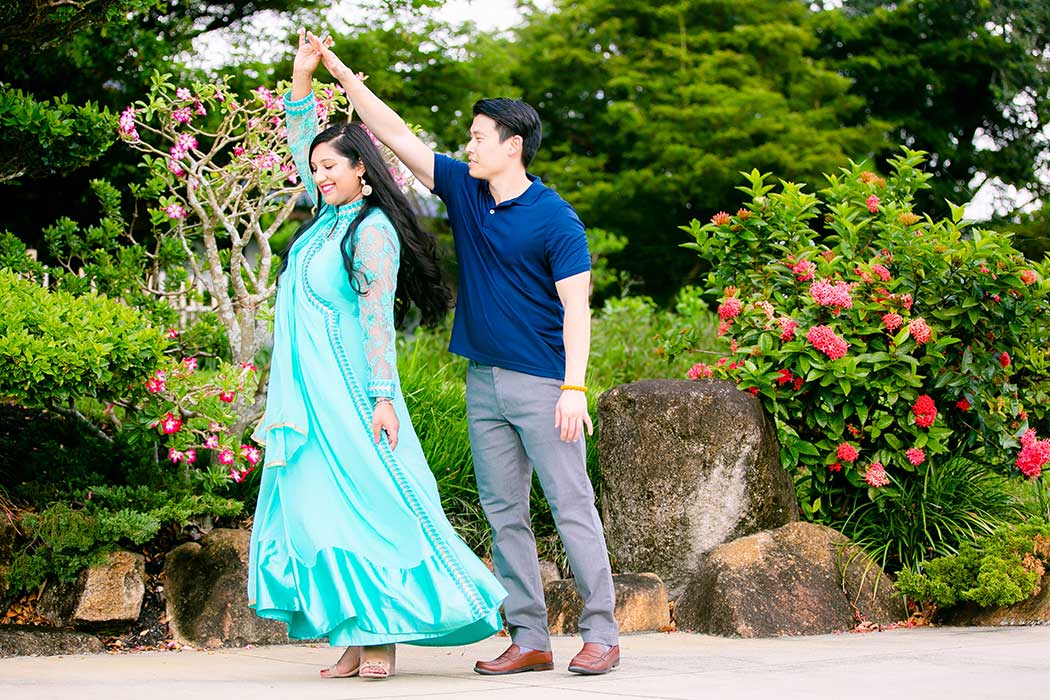 couple dancing during engagement photography at morikami
