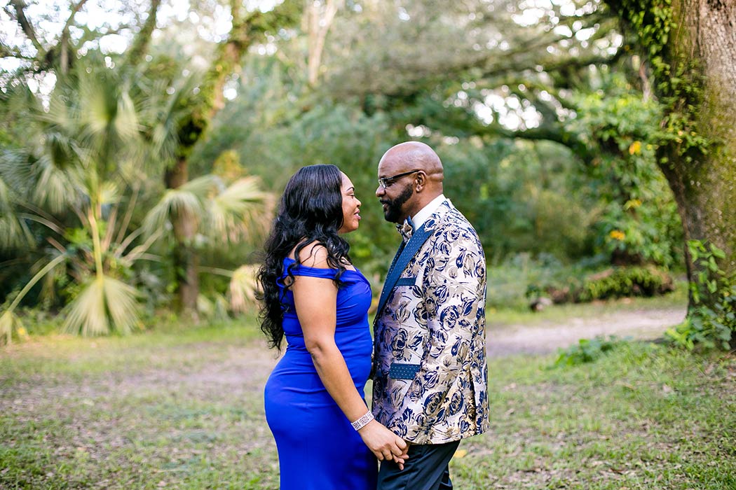 photograph of couple embracing during couples' photoshoot | romantic couples' photography | tree tops park engagement photos | tree tops park photography