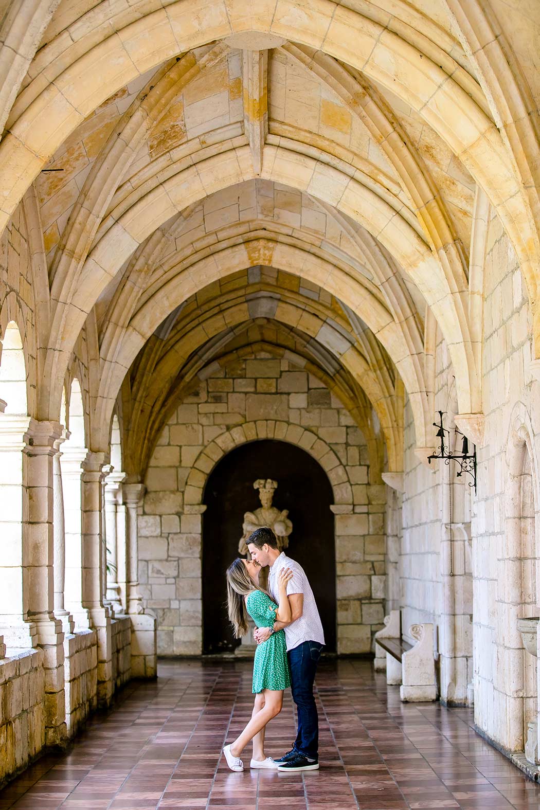 couple kissing in ancient spanish monastery, miami | andrea harborne photography | engagement photography fort lauderdale | fort lauderdale proposal photographs