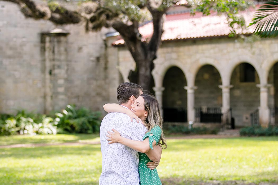 ancient spanish monastery miami | cuddling couple photo | fort lauderdale engagement photographer | couples photography spanish monastery