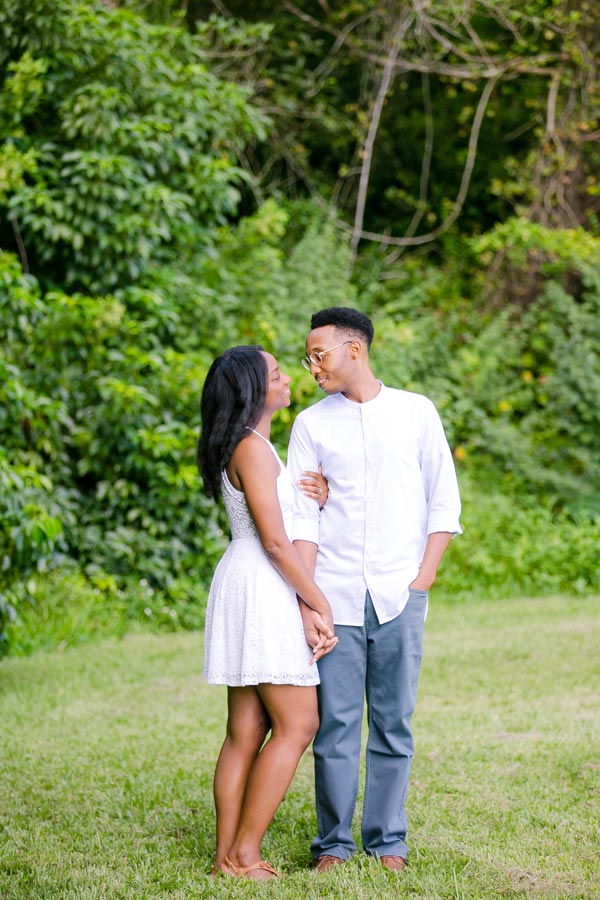 black couple pose at tree tops park, south florida, for engagement photography