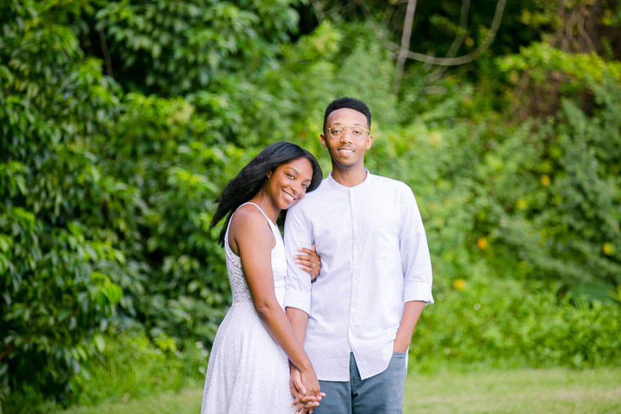 romantic engagement photography session with black couple wearing white at tree tops park, south florida