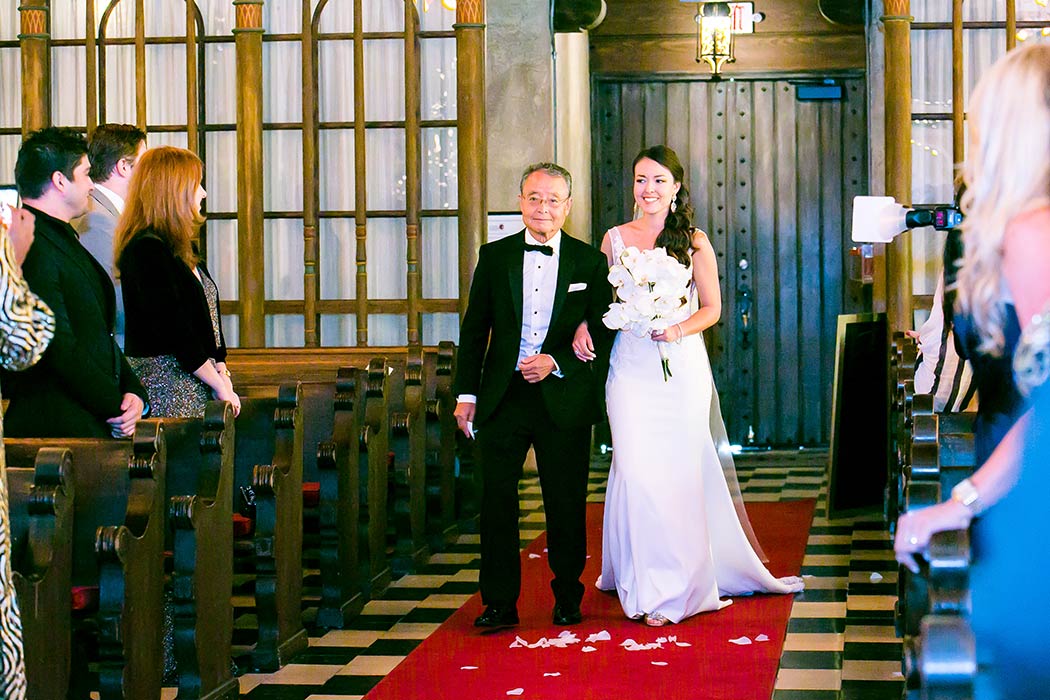 bride walks down aisle with her dad at coral gables congregational church miami | church wedding miami
