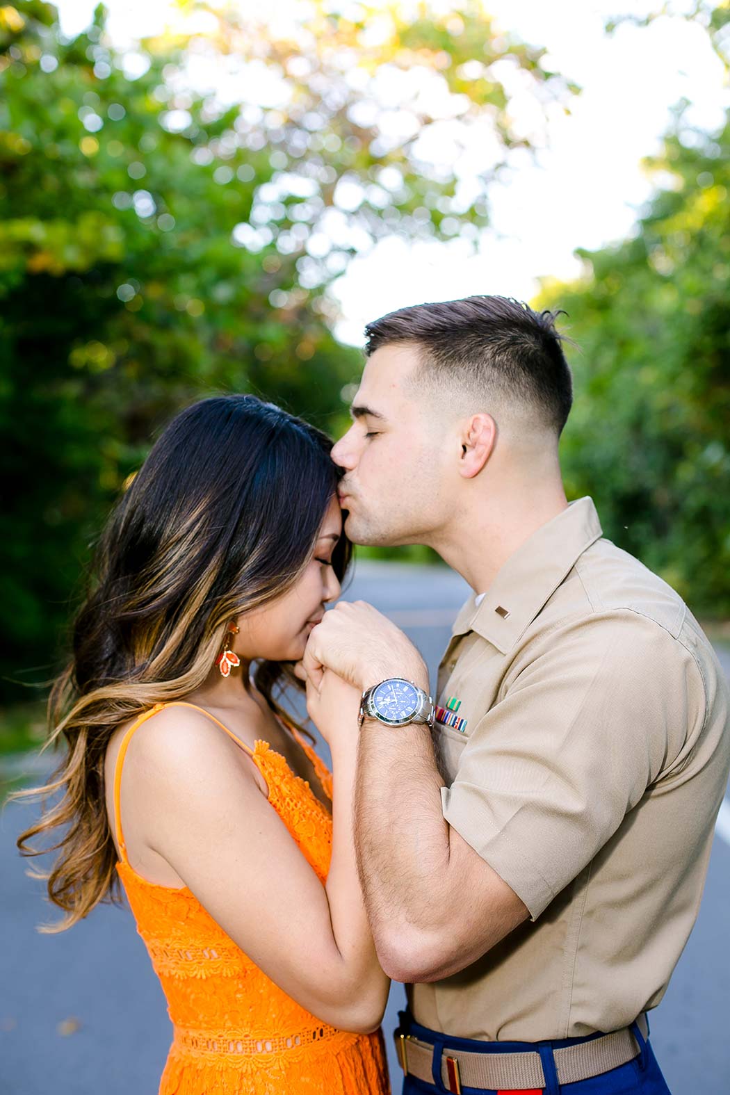 military engagement photoshoot | engagement session with orange dress | hugh taylor birch park engagement photoshoot