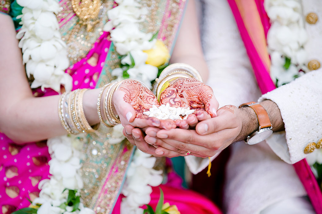 indian bride and groom wedding rice