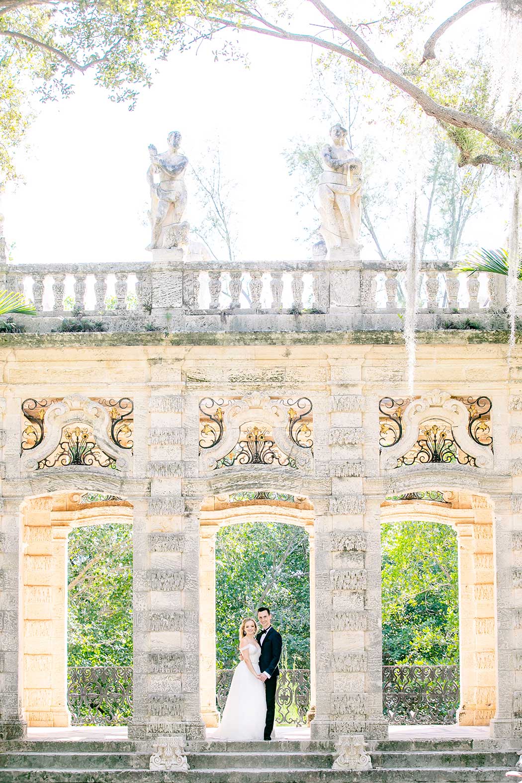 vizcaya museum + gardens engagement photography session | couple pose in vizcaya gardens for photoshoot | vizcaya museum engagement photos