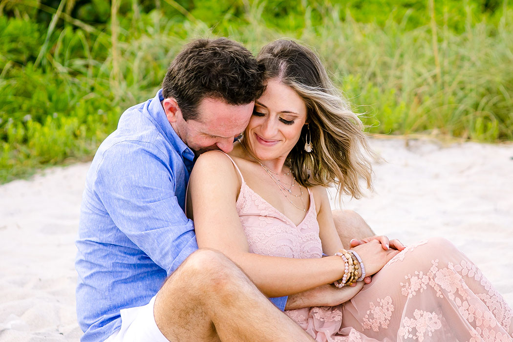 sitting pose for couples on beach for photography | fort lauderdale surprise beach engagement | fort lauderdale beach proposal photoshoot