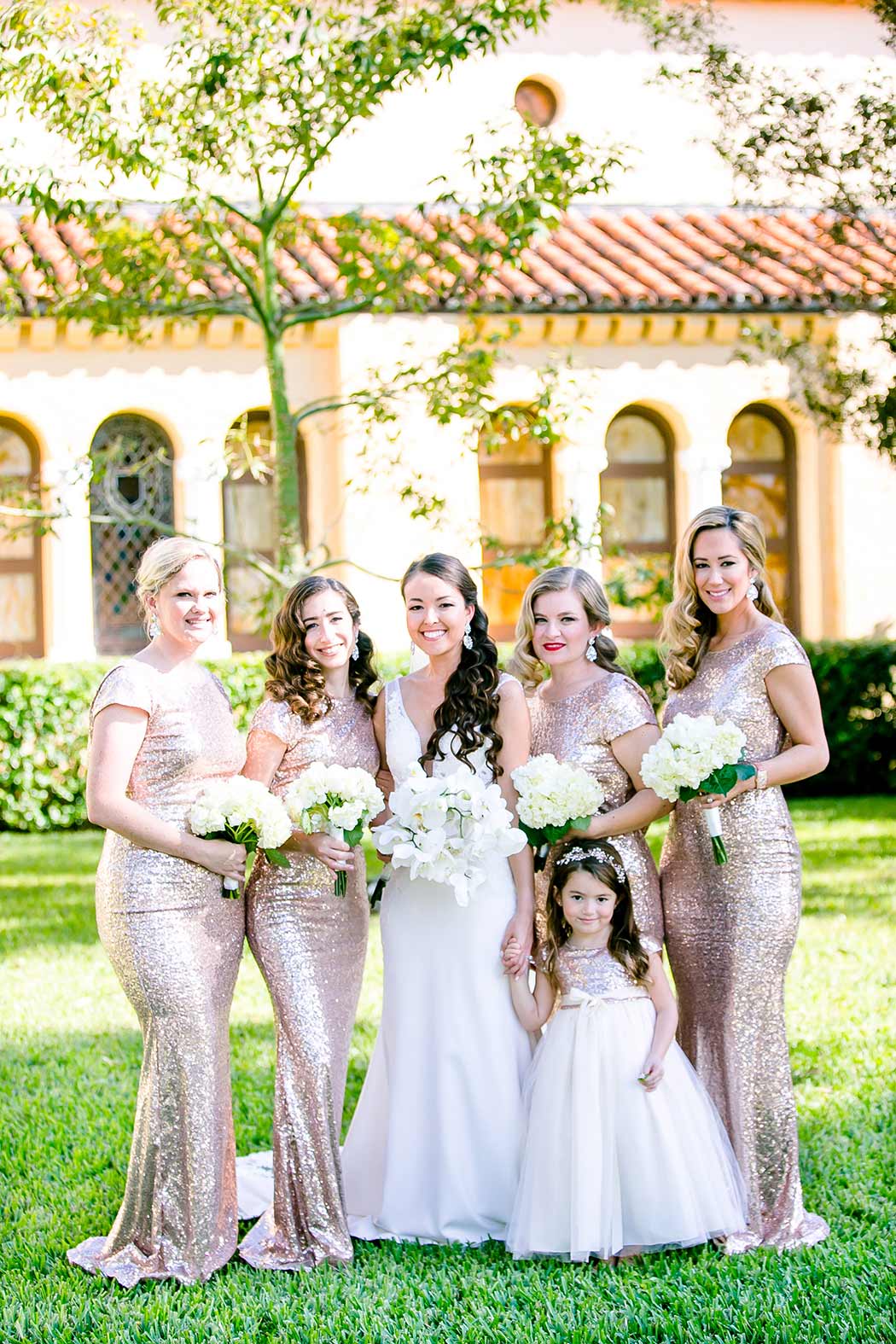 bride and bridesmaids outside miami church | gold bridesmaid dress | coral gables congregational church wedding