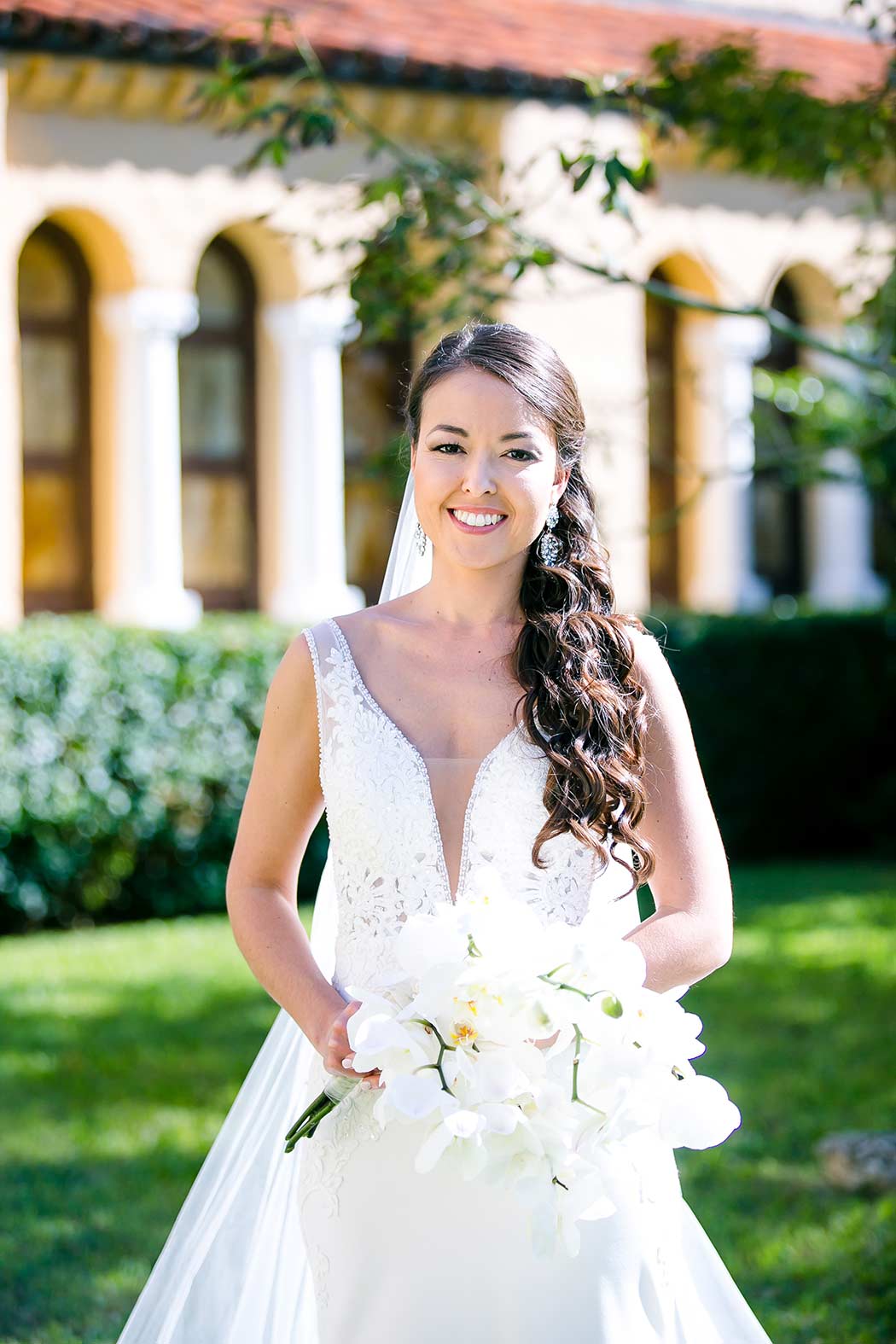 beautiful japanese bride posing for wedding pictures coral gables congregational church miami | japanese bride