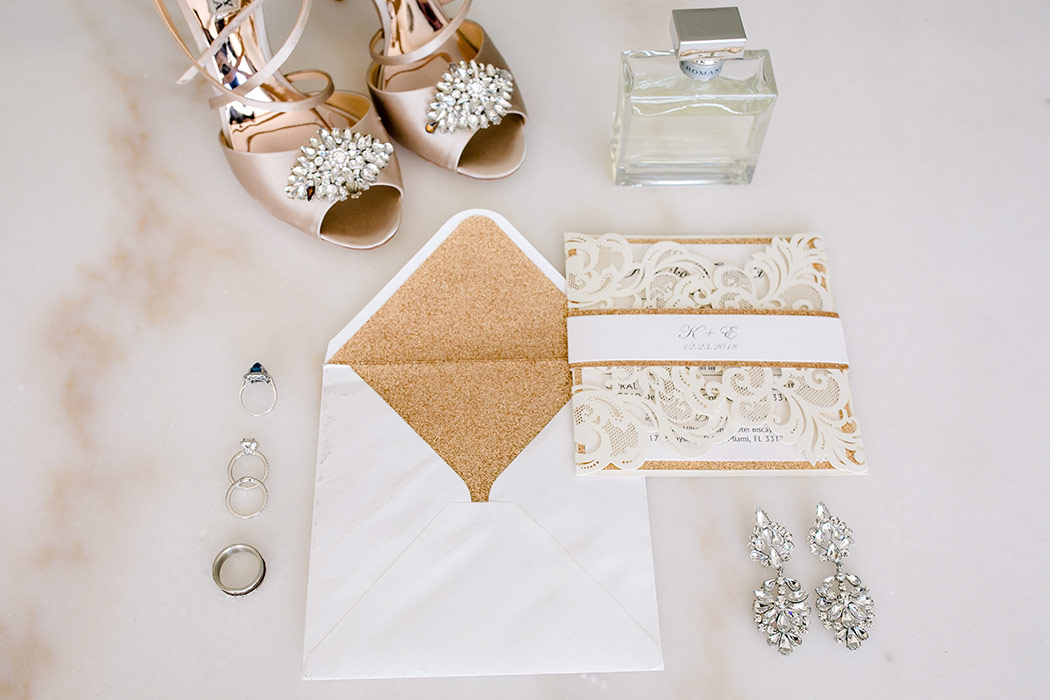 wedding photography detail shot including bridal shoes, stationery and jewelry 