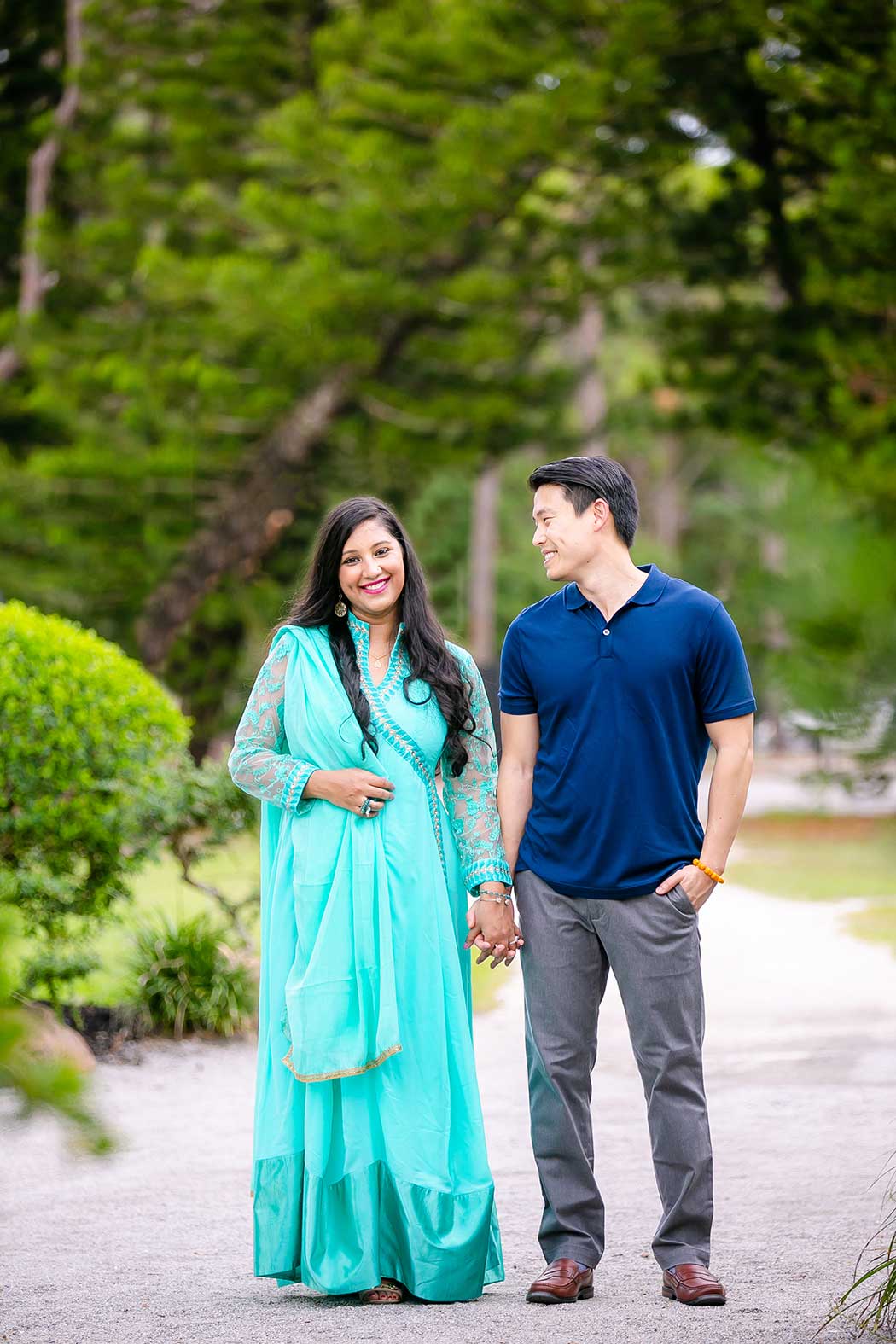 indian couple pose for engagement in morikami | morikami engagement photographer | teal sari on indian girl