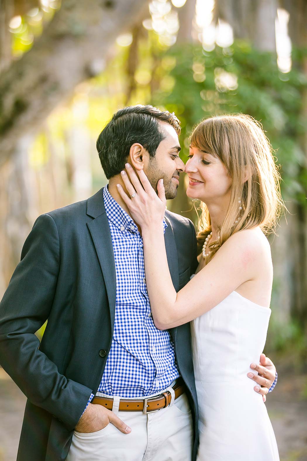 indian groom and american woman pose for engagement photographs | fort lauderdale engagement photographer