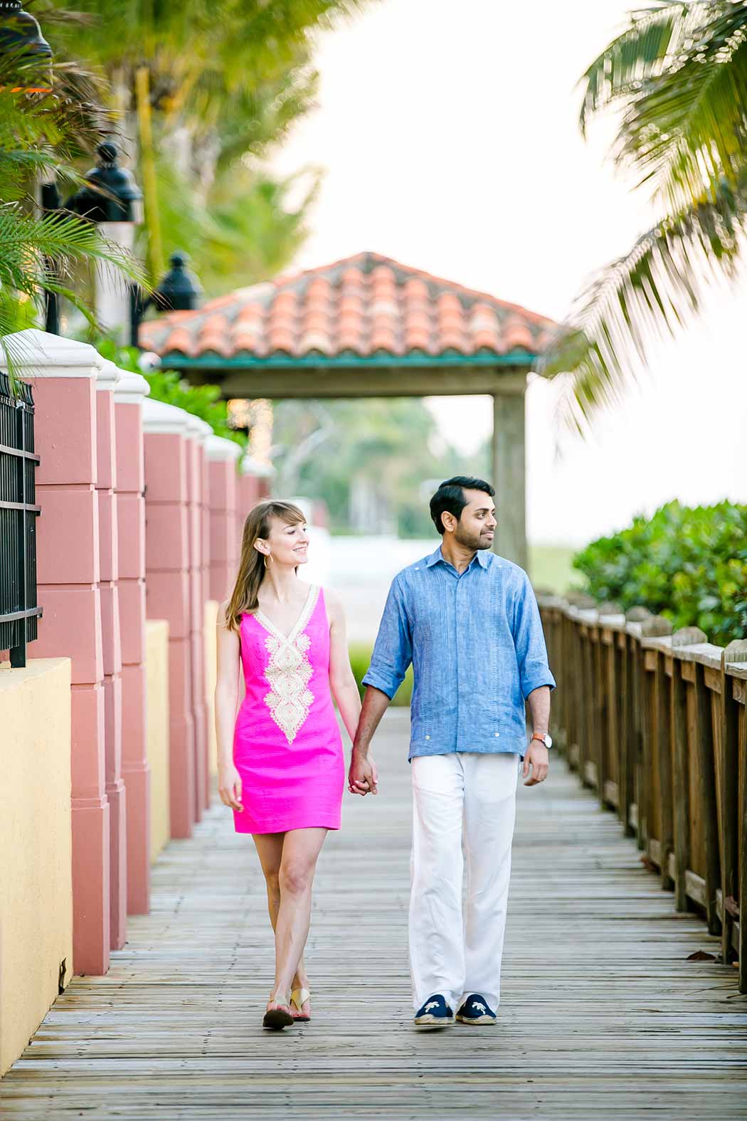hugh-taylor-birch-state-park-engagement-session-fort-lauderdale-4-new engaged couple walk on wooden walkway | fort lauderdale beach engagement | beach engagement photography fort lauderdale | beach walkway photoshoot in south florida