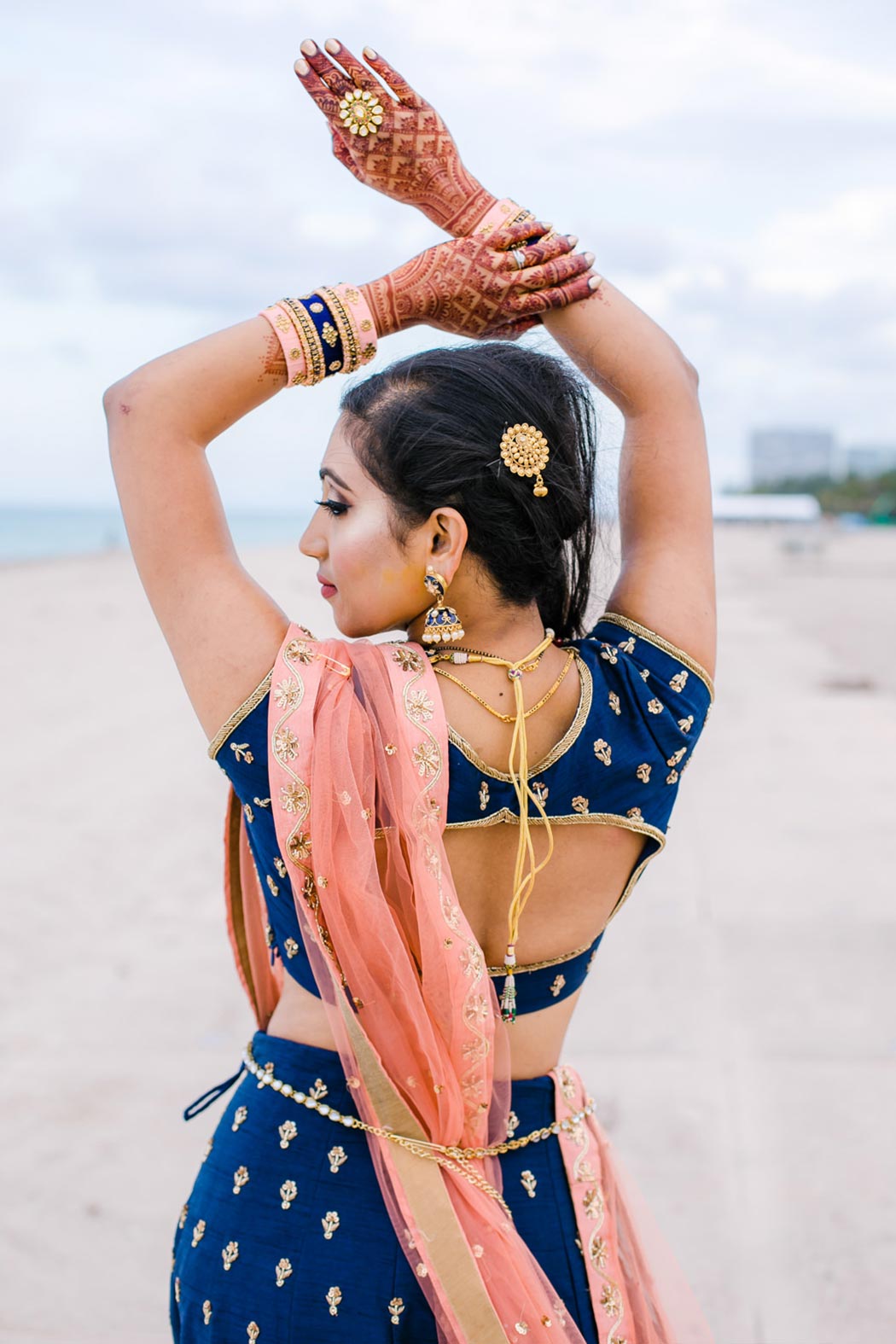 beautiful india bride in blue and gold sari