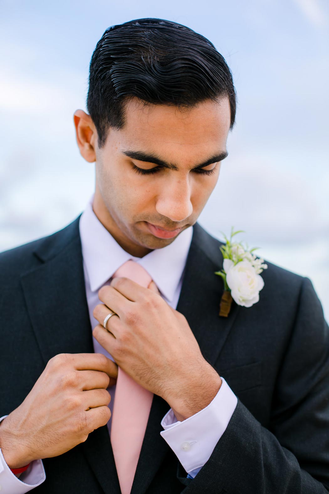 handsome indian groom on fort lauderdale beach