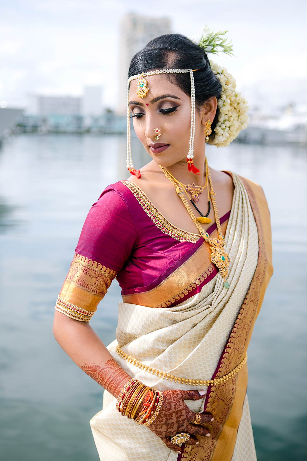 indian bride in gold and red sari