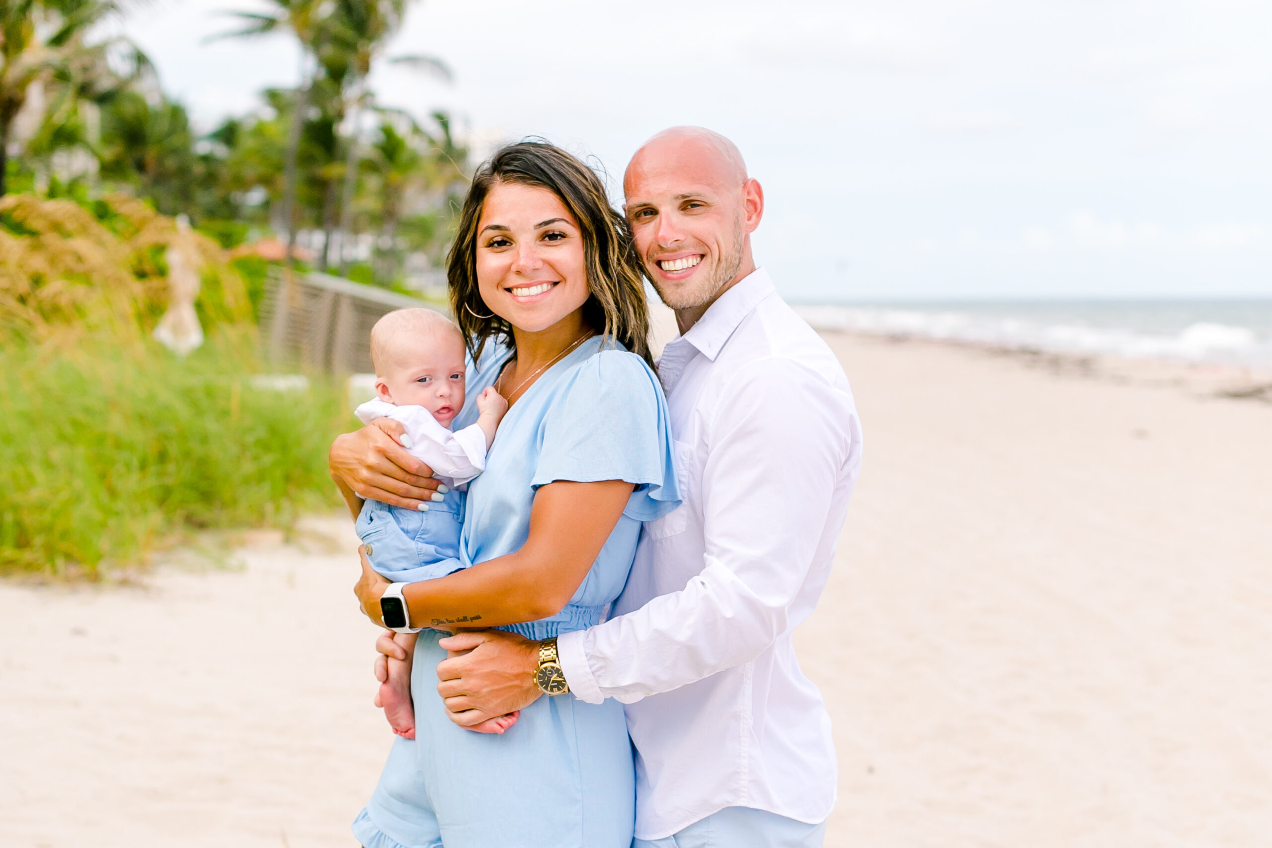 pose for family photography with young baby | fort lauderdale family photographer | engagement photos on fort lauderdale beach