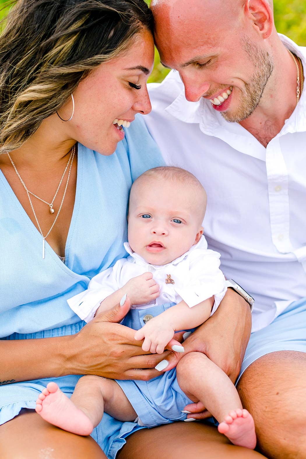 family with 3 month old baby photographs | family of three pose on fort lauderdale beach | fort lauderdale beach family photoshoot