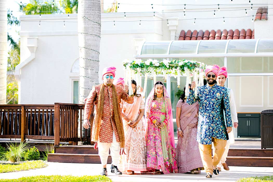 indian bridal procession | indian bride with floral canopy | indian wedding photographer south florida