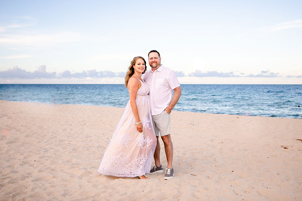 couple pose for beach maternity photo | photographer for maternity photos fort lauderdale | fort lauderdale beach maternity photographer
